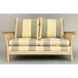 SOFA BY ANGRAVES, rattan and cane bound frame, with striped cushions by 'Angraves', 144cm W.
