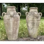 GARDEN OLIVE JARS, a pair, weathered reconstituted stone of olive jar tapering form, 79cm H. (2)
