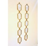 ACCENT WALL MIRRORS, a pair, gilt frames, 144cm x 14cm.