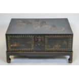 TRUNK ON STAND, 38cm H x 78cm W x 56cm D, Chinese black lacquer and gilt decorated.