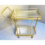 COCKTAIL TROLLEY, 90cm high, 80cm wide, 39cm deep, 1960s French style, mirrored glass shelves,