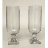 STORM LANTERNS, a pair, etched cut glass cylindrical with stepped base, 40cm H. (2)