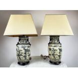 LAMPS, a pair, Chinese vase form blue and white decorated with pagodas and landscape scenes with