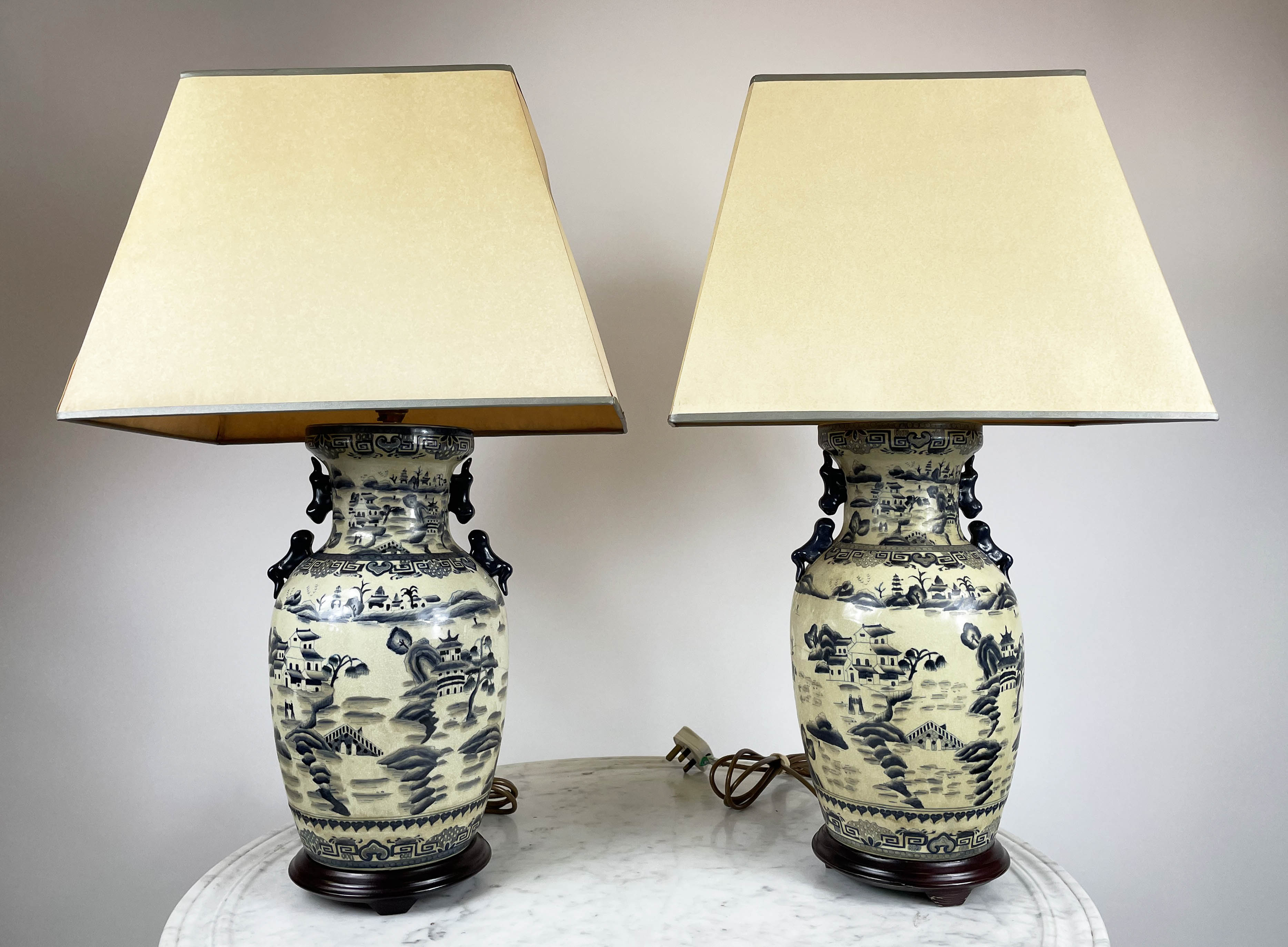 LAMPS, a pair, Chinese vase form blue and white decorated with pagodas and landscape scenes with