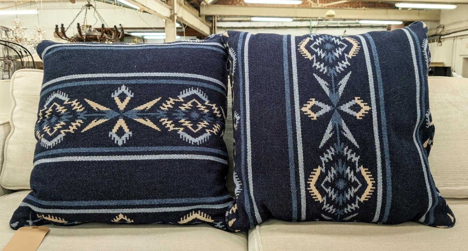 CUSHIONS, a pair, Moroccan style blue patterned fabric, 53cm x 53cm. (2)