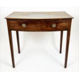 BOWFRONT WRITING TABLE, George III period mahogany with full width frieze drawer and square tapering