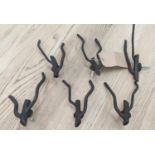 COAT HOOKS, a set of six, wall mounting, bronzed metal, twig design, 25cm H at largest. (6)