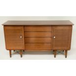 SIDEBOARD, 1970s teak with four drawers flanked by cupboard doors stamped 'Beautility', 154cm x 52cm