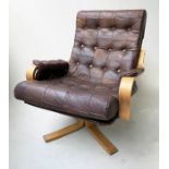 REVOLVING LOUNGE CHAIR, 69cm W, 1970s Danish style, buttoned patchwork leather, beechwood framed.