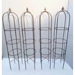 ARCHITECTURAL GARDEN OBELISKS, set of four, 150cm high, 33cm diameter, distressed rust finish metal.