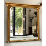 OVERMANTEL MIRROR, Victorian giltwood with arched bevelled mirror plate and fan angles, 110cm x