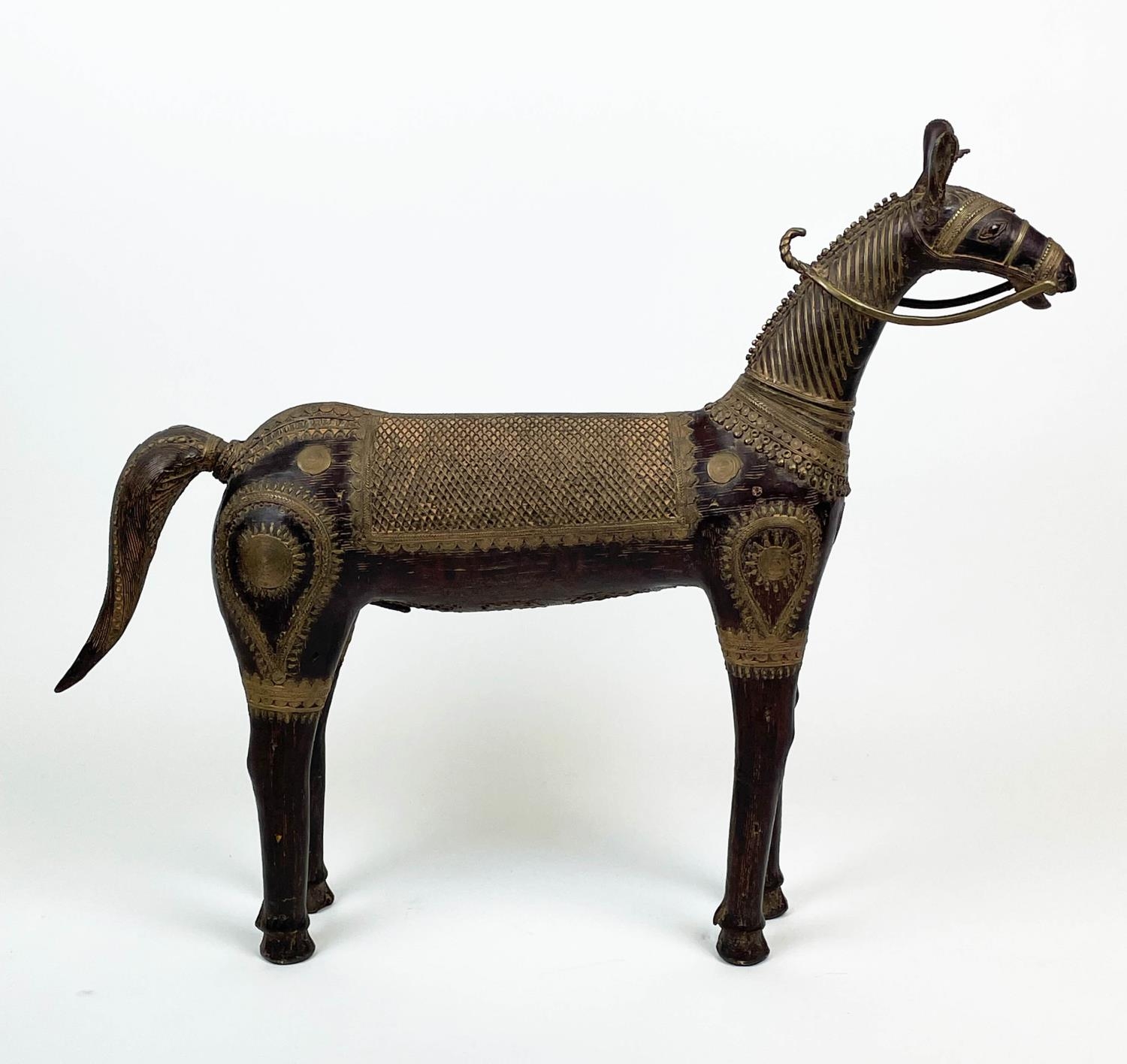 INDIAN BRONZE HORSE, embellished with saddle and decorative detail, 90cm L x 74cm H.