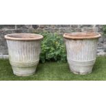 GARDEN PLANTERS, a pair, weathered terracotta each of tapering fluted form, 46cm W H x 46cm W. (2)