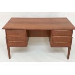 DESK, 1970s Danish teak with six frieze drawers and tapering supports, 130cm x 71cm x 74cm H.