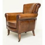ARMCHAIR, brass studded tan brown leather with rounded back and arms and tapering supports with