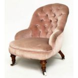 SLIPPER ARMCHAIR, Victorian walnut with faded rose pink velvet buttoned upholstery, and turned front