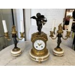 CLOCK GARNITURE, French 19th century, having cupid mounted on top of the clock, with matching