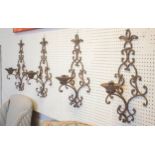WALL SCONCES, each 52cm H x 31cm W, a set of four, wrought metal in an antiqued finish. (4)