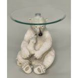 POLAR BEARS TABLE, circular glazed top on polar bear and cub support, 47cm W x 52cm H.