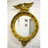 WALL MIRROR, 70cm H x 46cm W, Regency style giltwood with circular plate and eagle surmount.