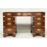 CAMPAIGN STYLE DESK, mahogany and brass bound with gilt tooled green leather top and nine drawers,