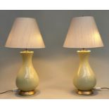 TABLE LAMPS, a pair, 'Louisa' lemon yellow glazed ceramic of vase form with giltwood bases and
