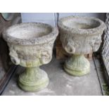 GARDEN URNS, 62cm H x 53cm W, a pair, reconstituted stone with lion mask decoration. (2)
