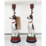 DOG CANDELABRA, a pair, glazed ceramic, gilt mounts, 35cm H. (2)