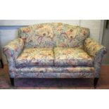 SOFA, 96cm H x 157cm W, Edwardian mahogany newly upholstered in foliate fabric.