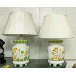 TABLE LAMPS, a pair, 72cm H, glazed ceramic with floral relief design, with pleated shades. (2)