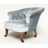 EDWARDIAN TUB CHAIR, early 20th century walnut with pale blue buttoned velvet upholstery with bow