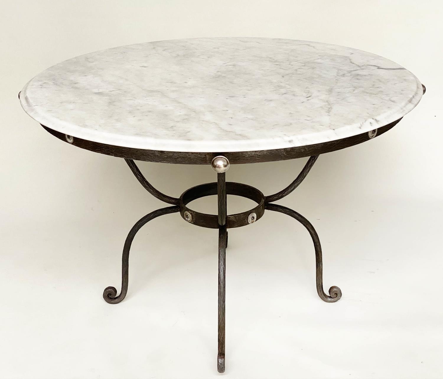 CIRCULAR/CENTRE TABLE, circular veined/striated white marble top, raised on wrought iron base,