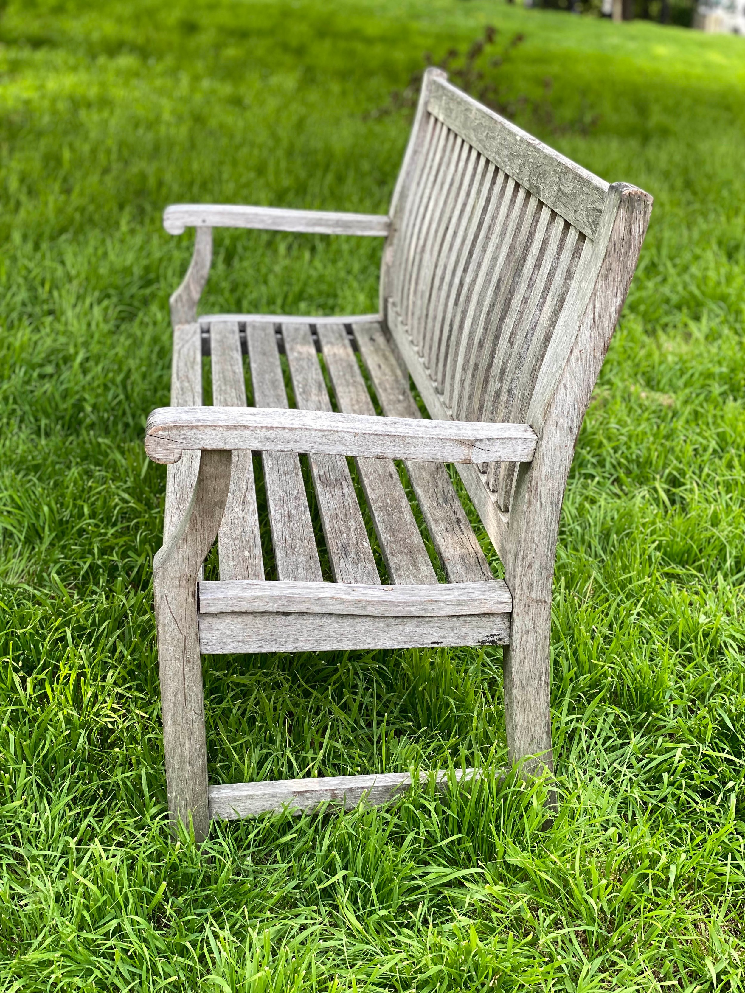 GARDEN BENCH, weathered teak of slatted construction with shaped back and scroll arms, 152cm W. - Image 2 of 7