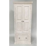 ARMOIRE, traditionally grey painted with two panelled doors enclosing hanging space above a single