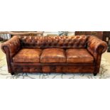 CHESTERFIELD SOFA, three seater, buttoned and studded tan leather, 210cm W.