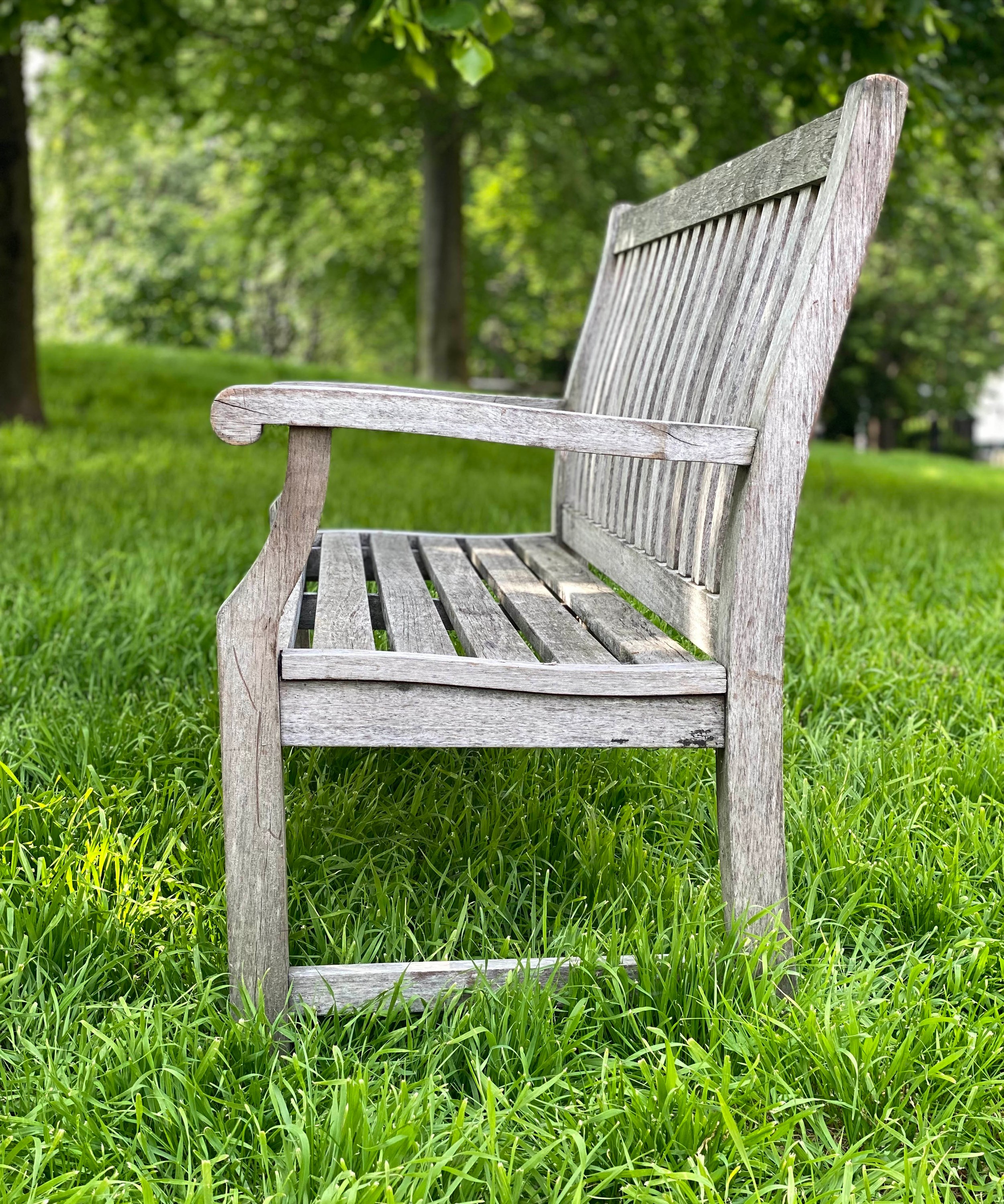 GARDEN BENCH, weathered teak of slatted construction with shaped back and scroll arms, 152cm W. - Image 3 of 7