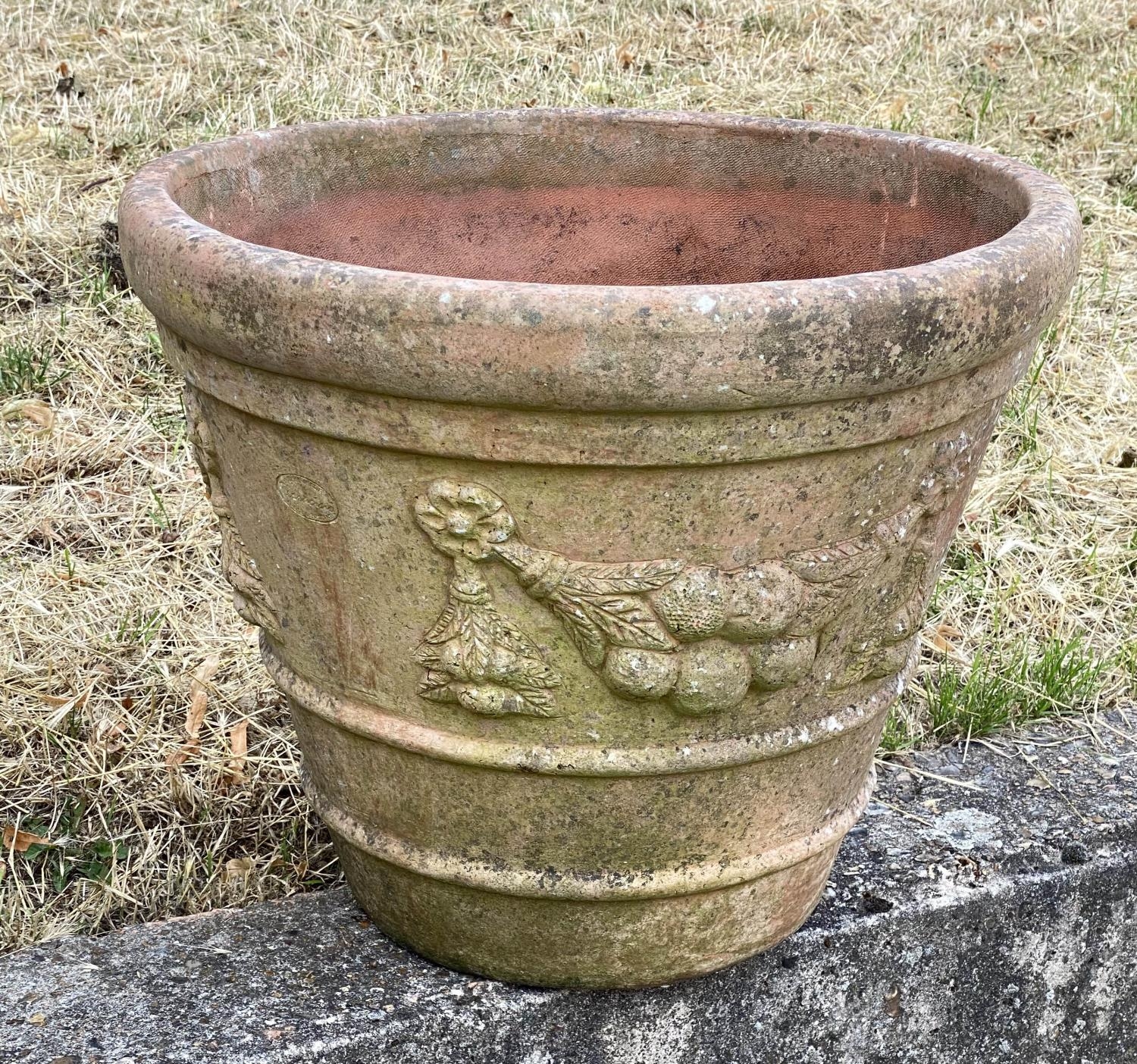 GARDEN TERRACOTTA PLANTERS, a set of three, large weathered terracotta with fruit decoration, 57cm W - Image 6 of 8