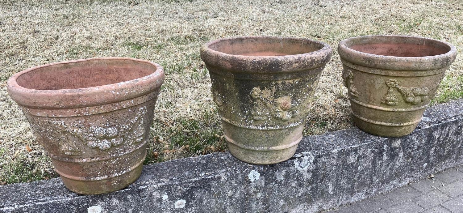 GARDEN TERRACOTTA PLANTERS, a set of three, large weathered terracotta with fruit decoration, 57cm W - Image 5 of 8