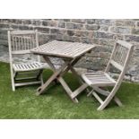 CHILD'S GARDEN ARMCHAIRS, a pair, weathered teak, folding with spindle back together with a