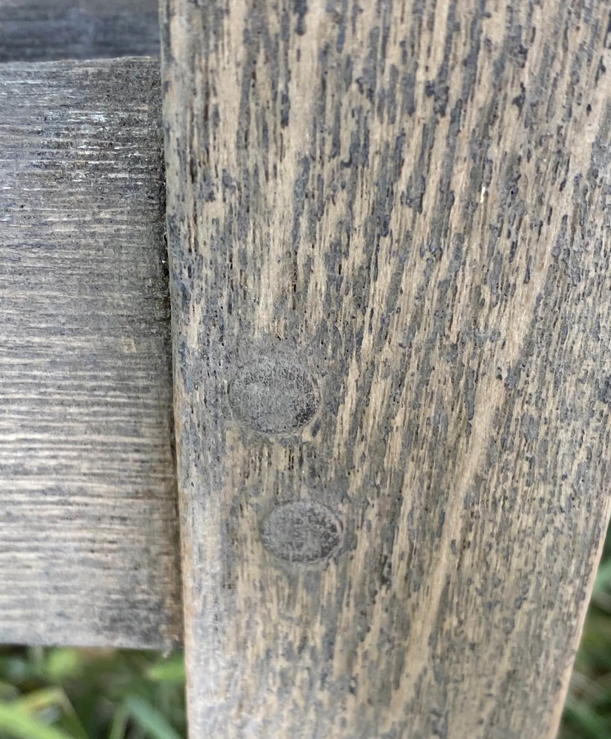 GARDEN BENCH, weathered teak with triangular splat back, 140cm W. - Image 5 of 7