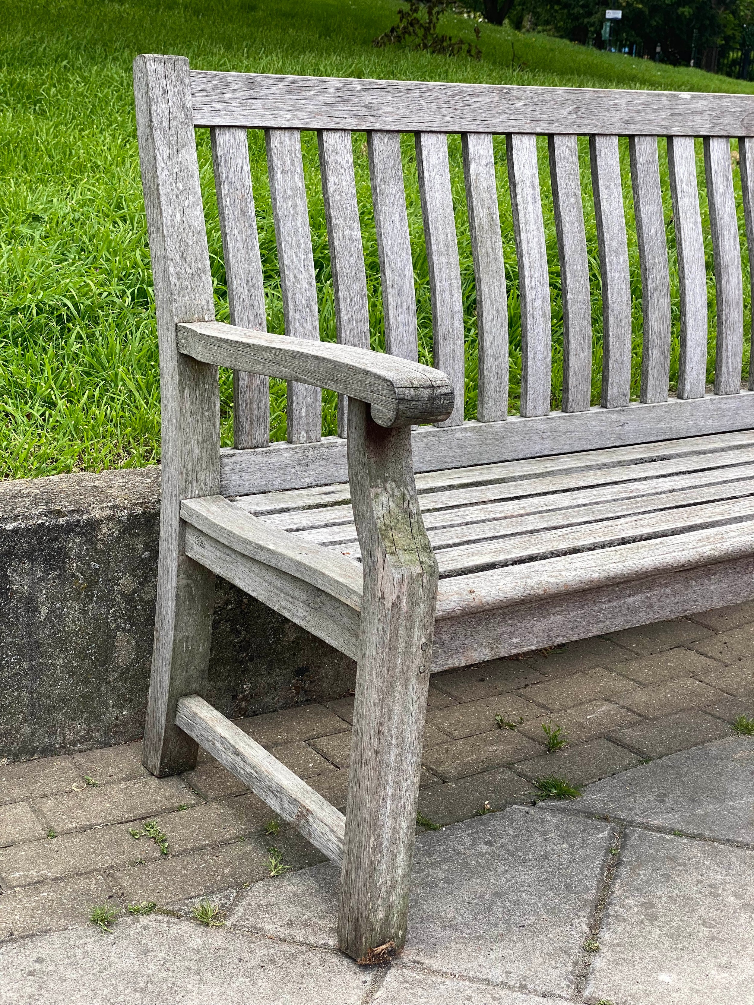 GARDEN BENCH, weathered teak of slatted construction with shaped back and scroll arms, 152cm W. - Image 7 of 7
