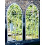ARCHITECTURAL WALL MIRRORS, a pair, 160cm high, 67cm wide, Gothic arched design, aged metal