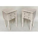 BEDSIDE CHESTS, a pair, French traditionally grey painted with pierced frieze and two drawers,