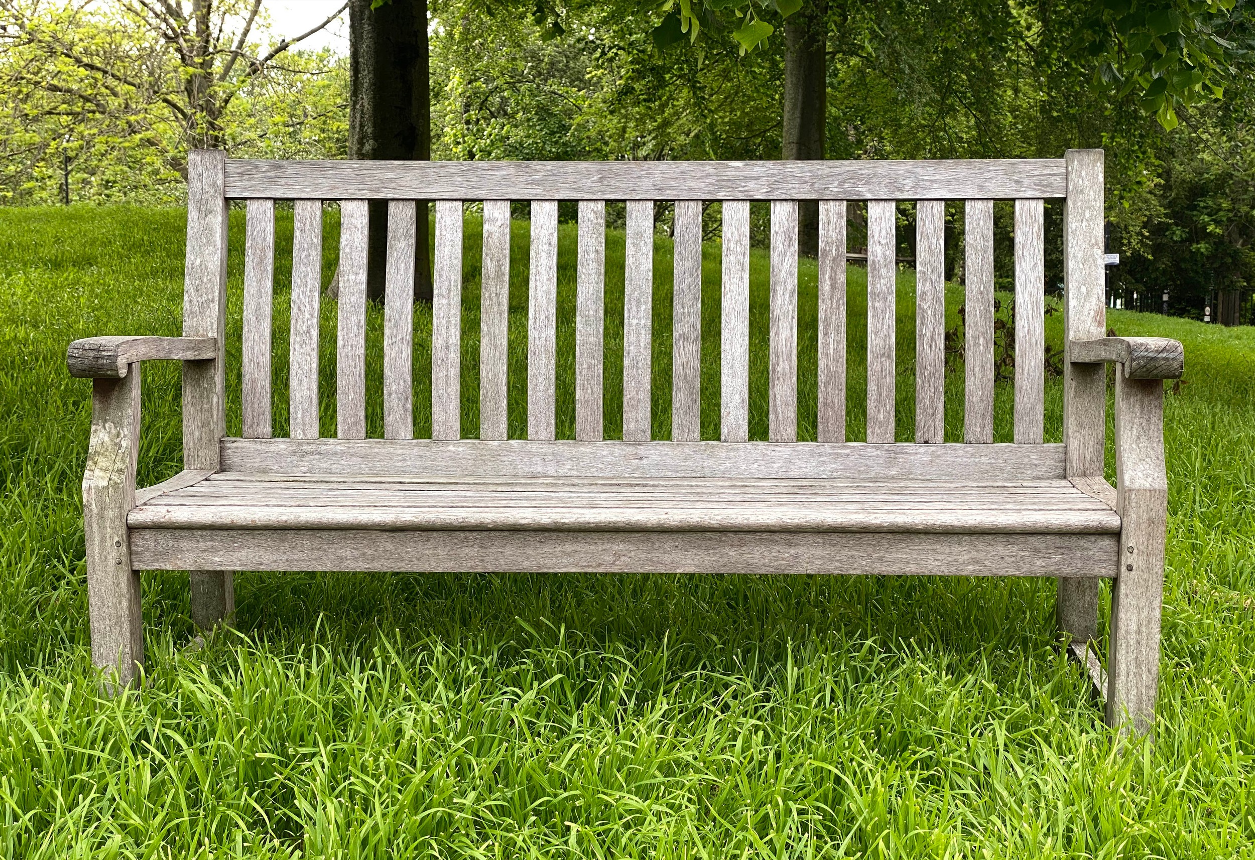 GARDEN BENCH, weathered teak of slatted construction with shaped back and scroll arms, 152cm W. - Image 4 of 7