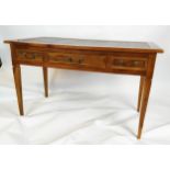 WRITING TABLE, French style walnut fitted with three drawers and leather inset top, 78cm H x 126cm