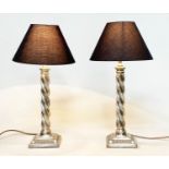 COLUMN LAMPS, a pair, barley twist silvered column and stepped bases, 76cm H. (2)