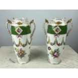 DRESDEN VASES, a pair, twin handled with foliate decoration, green bands and gilt highlights, 36cm