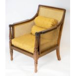 LIBRARY BERGERE, 89cm H x 64cm W, George IV mahogany, re-caned with later panelled seat and