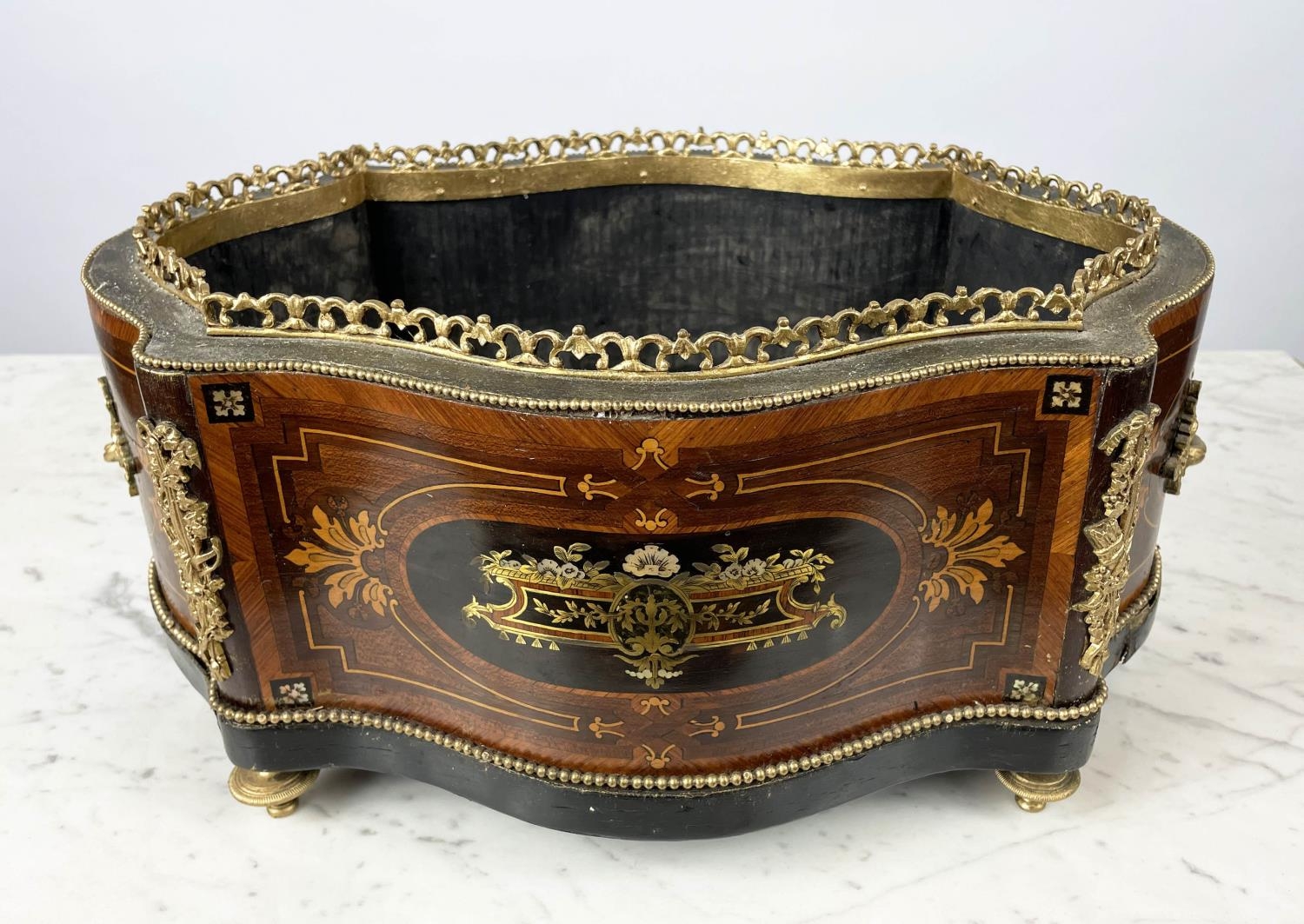 JARDINIERE, 19th century French, serpentine form with marquetry and brass inlay with bronze ormolu