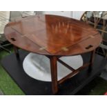 ARTHUR BRETT STYLE BUTLERS TRAY TABLE, mahogany removable top with hinged handles, oval glass cover,